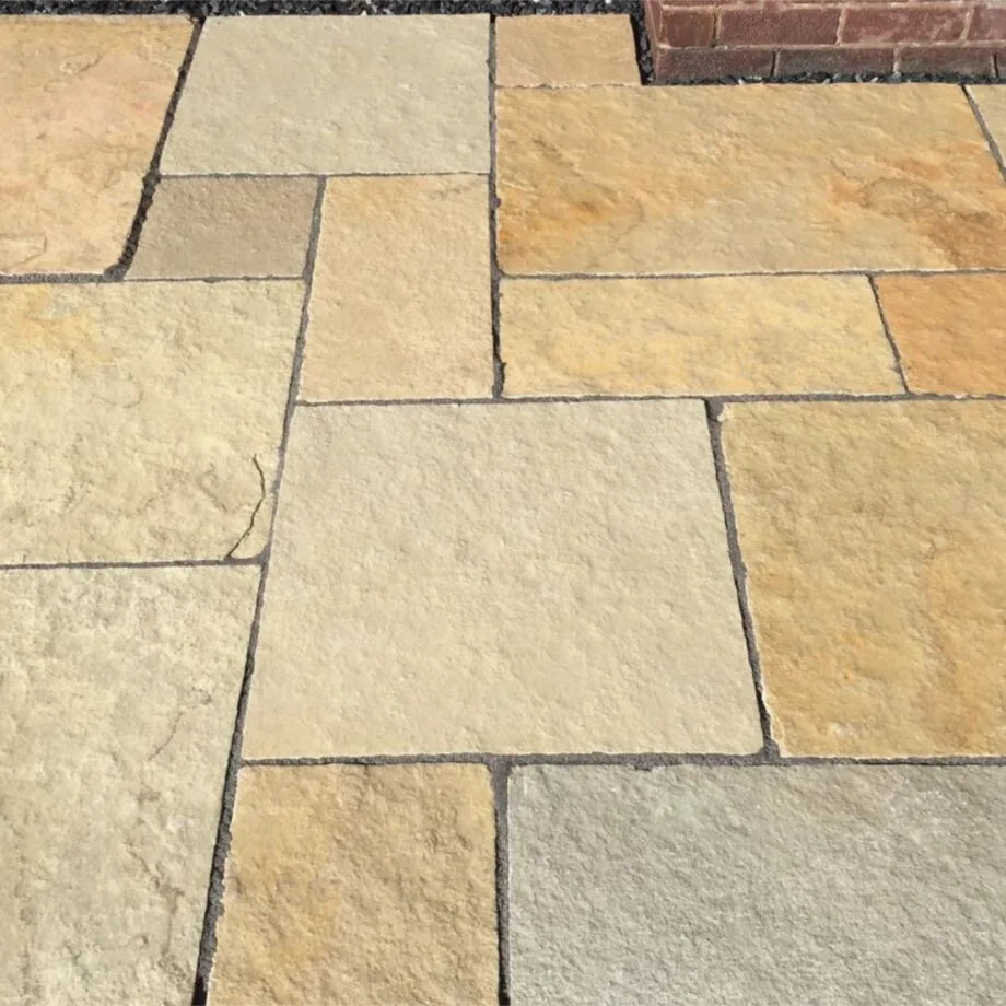 Yellow limestone flagstone patio paving in a random-coursed pattern at a Gauteng home